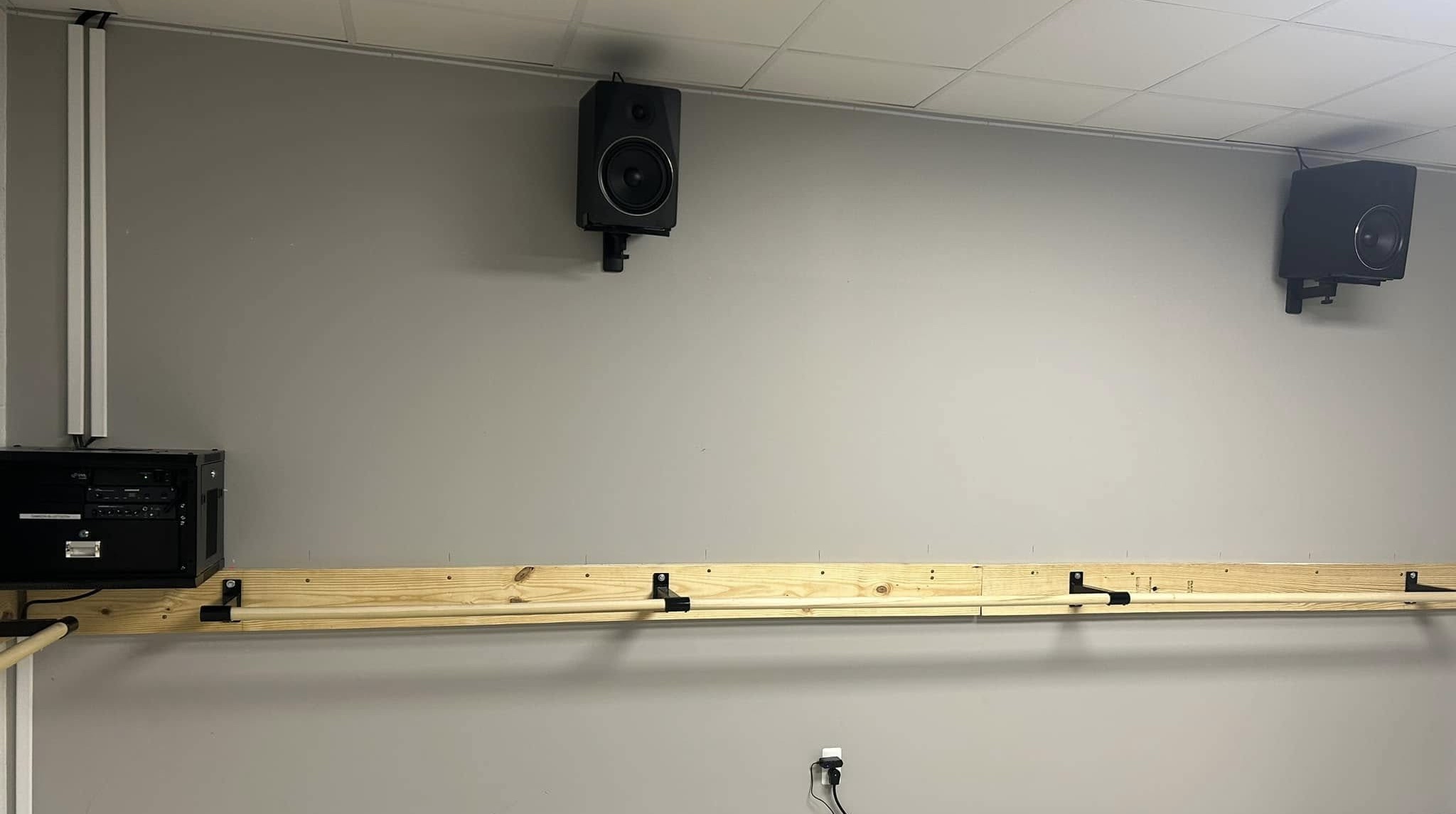 Audio system installation for women's gym barre workout room